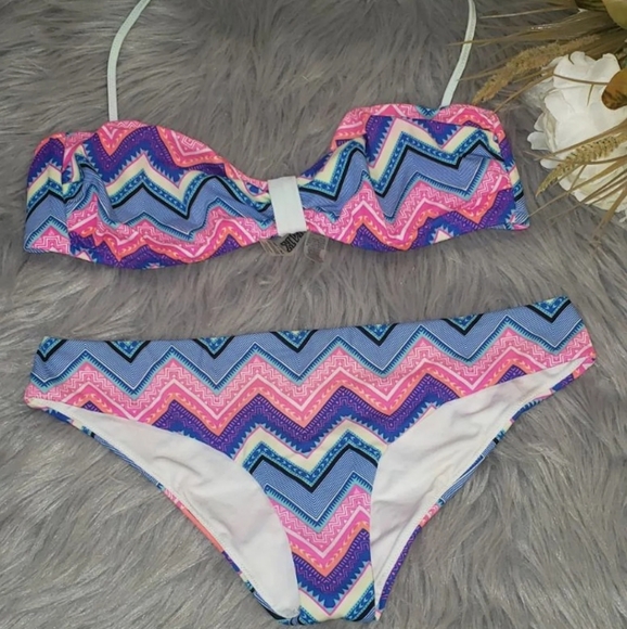 Bikini pink by victoria secret swim suit
The bott